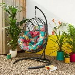 Black Egg Chair With Tropical Cushion